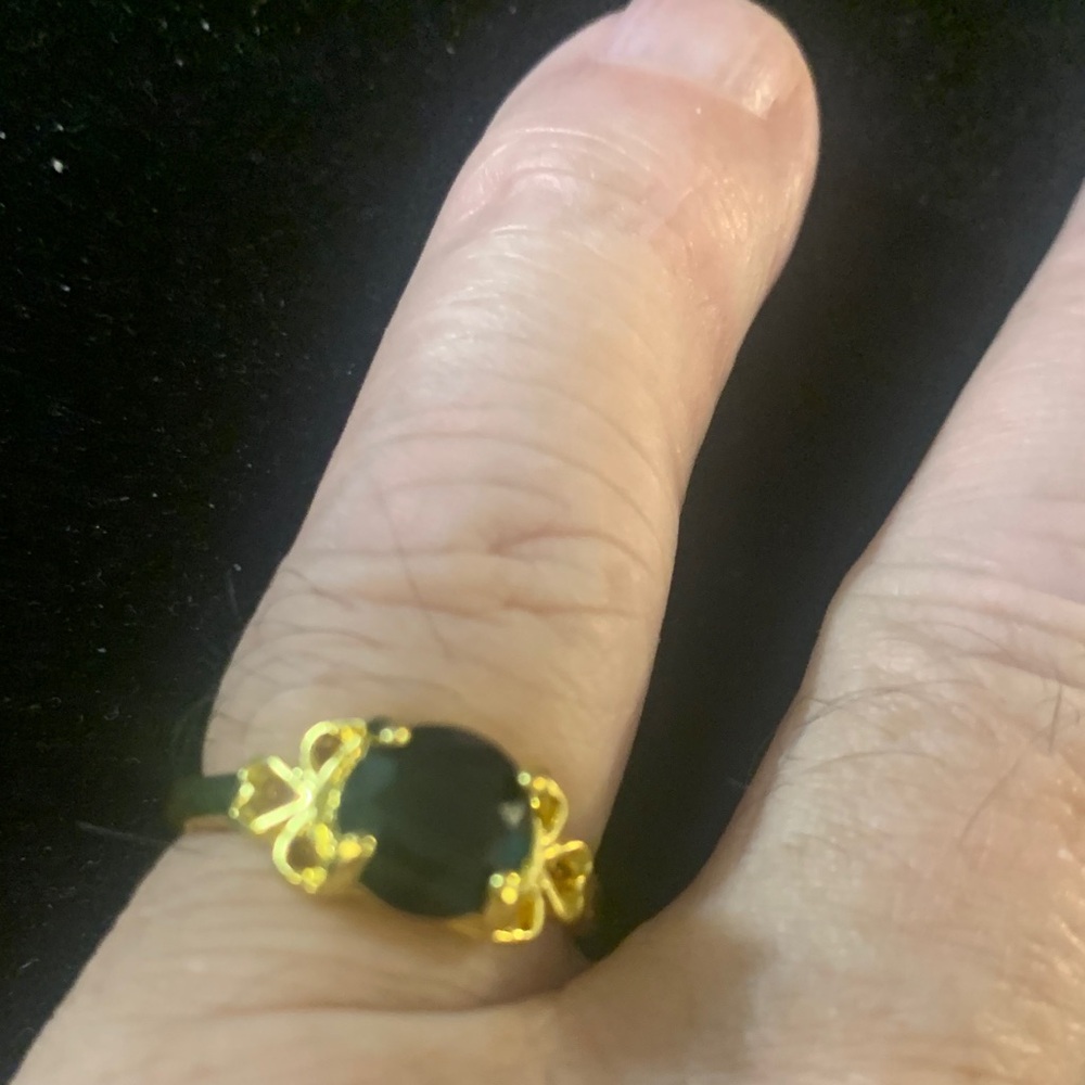 Elegant Gold and Black Ring